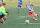  Rachel Peters (11) attacks the goal