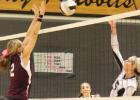 Erin Mayes (2) goes up for a solo block of the Lady Rabbit spike.