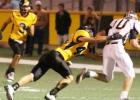 Cody Gibson (44) makes a nice open field tackle against Henrietta.