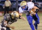 Ben Boucher (30) takes on the Gordon defender as he tries to get more yardage.