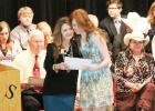 Savannah Wells receives the Cook Canyon Ranch Scholarship, presented by Jenny Coffee.