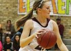 Erin Mayes (24) drives to the basket against Gorman.