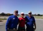 CISCO HIGGINBOTHAM EMPLOYEES, ANDY ANDERSON, L. AND DANIEL BRANDSTETTER, R,  MEET COAST TO COAST RUNNER ANNA JUDD. SHE HONORS ALL WOUNDED WARRIORS IN HER L.A. TO N.Y. QUEST.